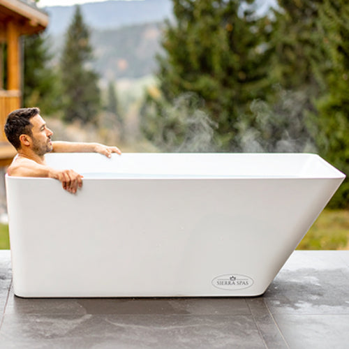 man in the white Pro XL cold plunge, extra-long tub for taller users