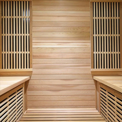 inside view of wooden Roslyn 4-person infrared sauna in cedar showing two benches