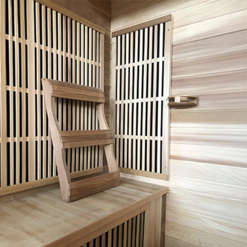 wooden Ergonomic backrests on a bench inside the Roslyn 4-person infrared sauna in cedar